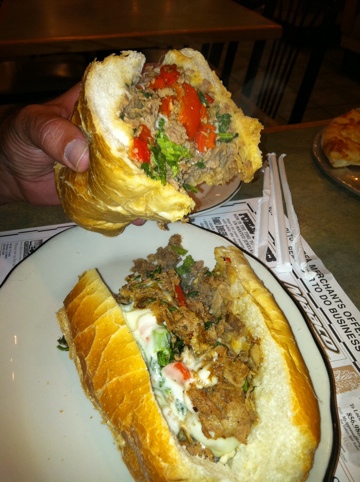 Foot-long cheesesteak Italiano: steak, provolone, broccoli raab, roasted peppers and onions. Take the canoli. Leave the sandwich!