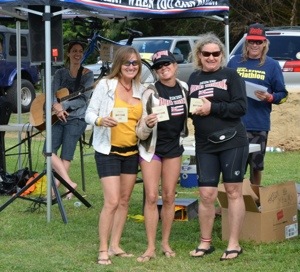 Fun Guy and event organizer Chris Gardner over my left shoulder. Third place, winners' circle. Age group: 50-54, Women Who Refuse To Act Their Age.