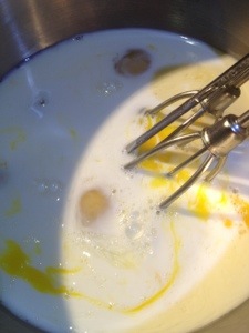 Beat milk with eggs until a mellow yellow. 