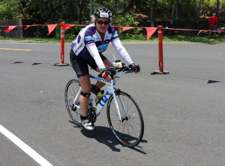 Honu 2014 finishing the bike and telling John how I'm worried I won't finish in time.
