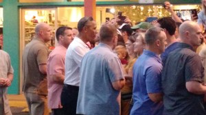President Obama with Secret Service agents held babies, talked to the littles, and greeted people who gathered to see him at Island Snow Hawaii in Kailua. 
